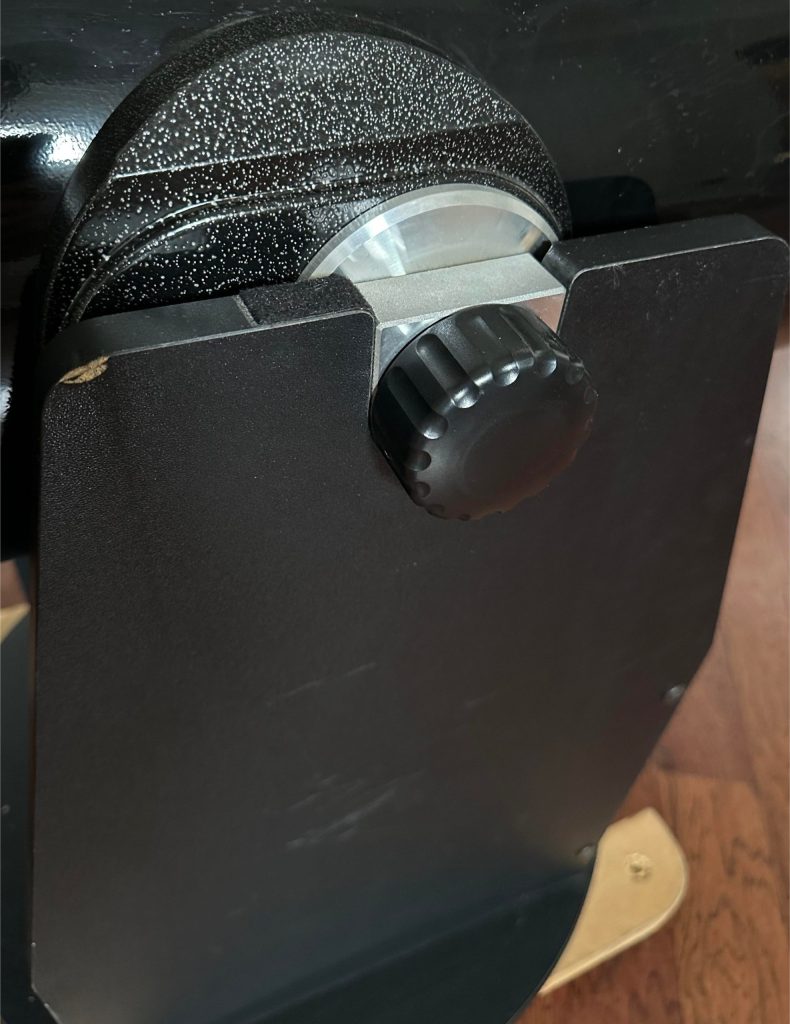 Side of Z12's dobsonian mount showing the altitude bearings and knob
