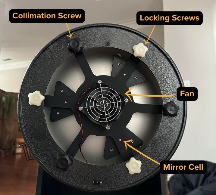 Collimation and locking screws along with the battery operate fan in the backside of the Zhumell Z12's optical tube.