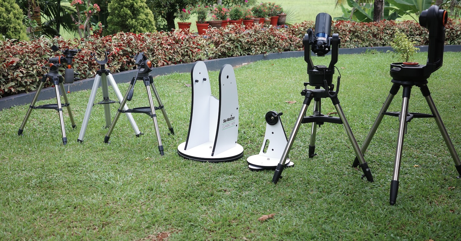Different types of mounts and tripods. The ETX 90 has an optical tube attached, others don't