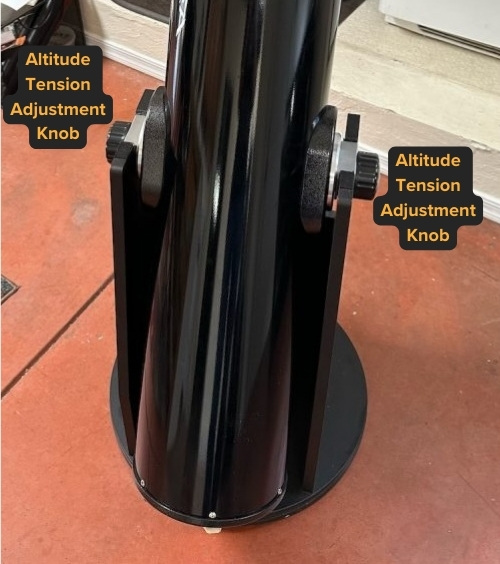 Back view of AD8's dobsonian mount with both of the altitude tension adjusting knobs marked