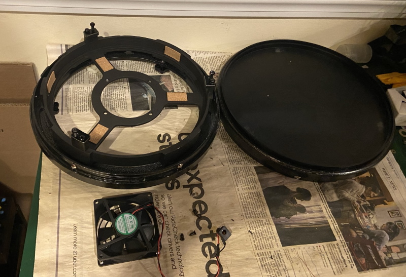 Mirror cell of Z10 taken apart. Mirror cell spider and the battery powered fan can be seen. This is same as the Apertura AD10's mirror cell.