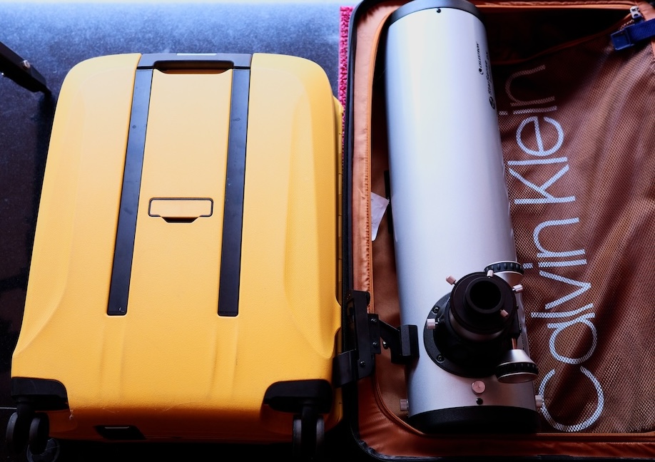 StarSense DX 130AZ reflector OTA placed in a checked in baggage with a carry on baggage near it for reference