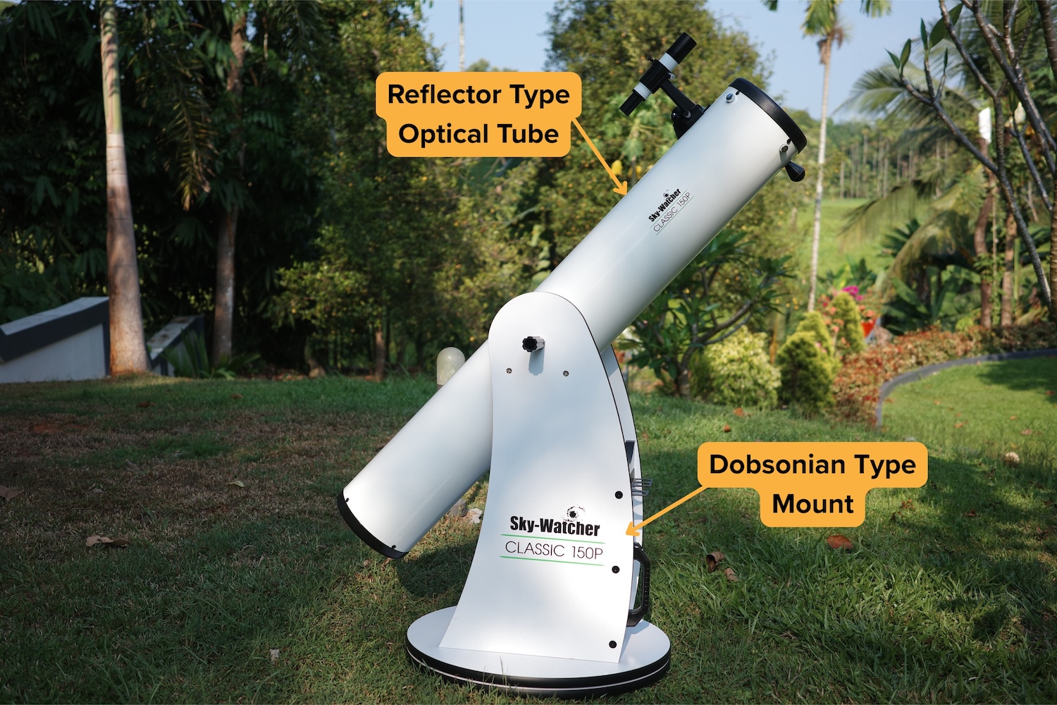 A dobsonian telescope with its optical tube and mount marked